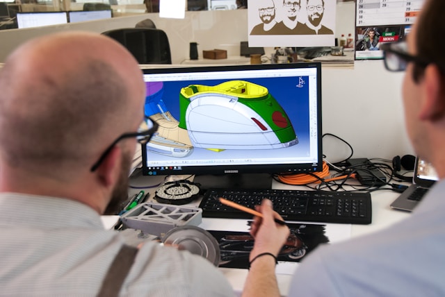 Engineers working on a CAD model for custom thermoelectric product design.